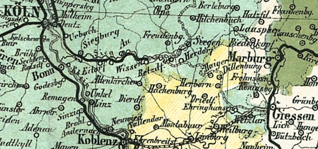 Ein detaillierter alter Stadtplan von Köln, Deutschland, der Straßen, Gebäude und Sehenswürdigkeiten zeigt, mit Text, der den Standort der Stadt angibt.
