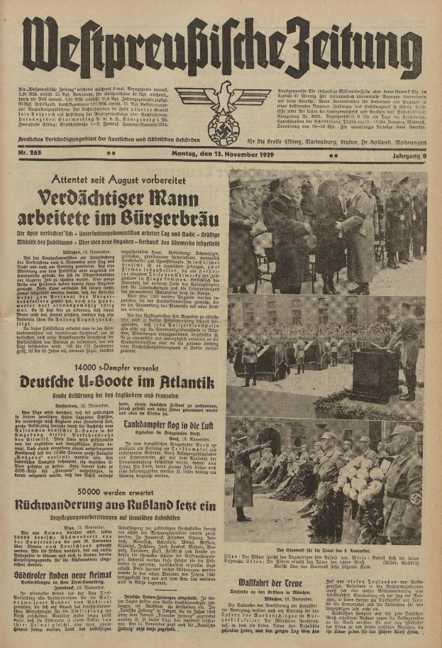 Schwarze-auf-Weiße-Titelseite einer deutschen Zeitung vom 13. November 1939 mit der Überschrift 'Weitpreubliche Zeitung', die eine Gruppe von Menschen in traditioneller deutscher Kleidung in einer feierlichen Umgebung zeigt.