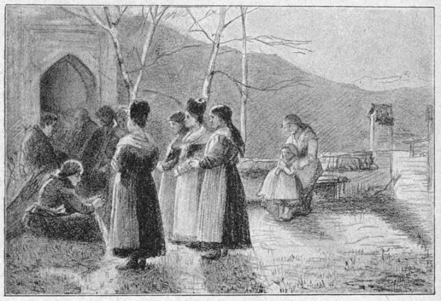 Eine Gruppe von Menschen vor einem Gebäude stehend, umgeben von Bäumen, Hügeln und einem klaren Himmel, mit dem Text "Victorian Women's Suffrage" unten in Schwarz-Weiß.